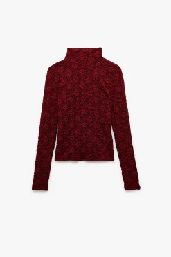 Blusa de encaje texturizada