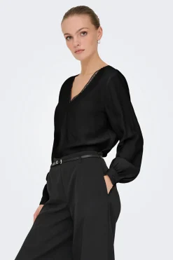 Blusa manga larga bordada