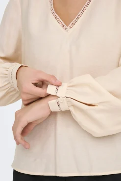 Blusa manga larga bordada