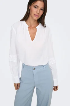 Blusa manga larga bordada