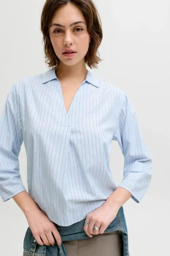 Blusa popel&iacute;n manga larga