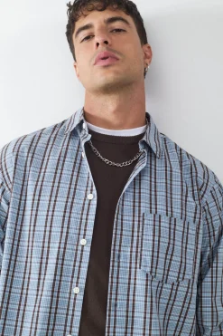 Camisa manga larga oversize bolsillo