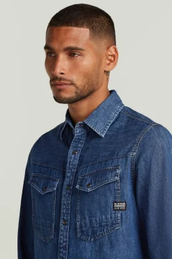 Camisa vaquera de manga larga y corte ajustado