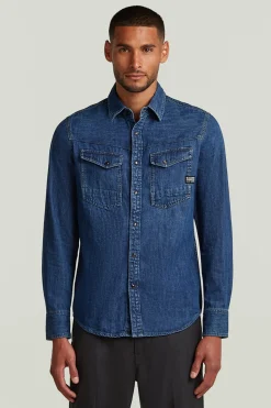 Camisa vaquera de manga larga y corte ajustado