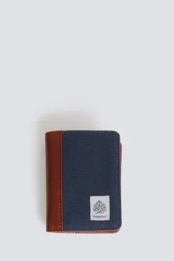 Cartera canvas y efecto piel