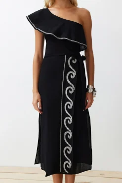 Conjunto top asim&eacute;trico y falda