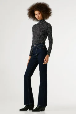 Pantal&oacute;n vaquero acampanado tiro alto