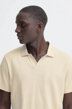 Polo de punto con cuello pico