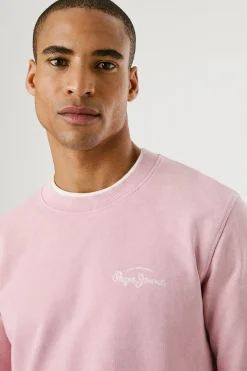 Sudadera lavada con logo peque&ntilde;o frontal y logo grande en la espalda.