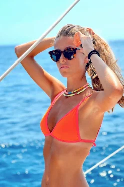 Top bikini triangular ribetes fl&uacute;or