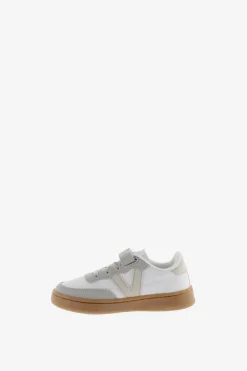 Zapatillas deportivas de ni&ntilde;os con piezas en contraste y cord&oacute;n el&aacute;stico
